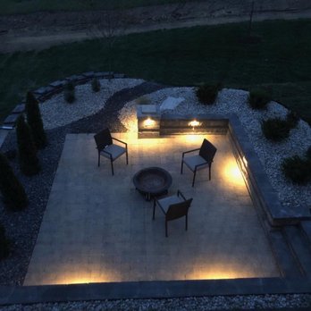 Reisner Lawn & Landscape - a patio with a fire pit - Landscaping Near Me - Lee's Summit, Missouri