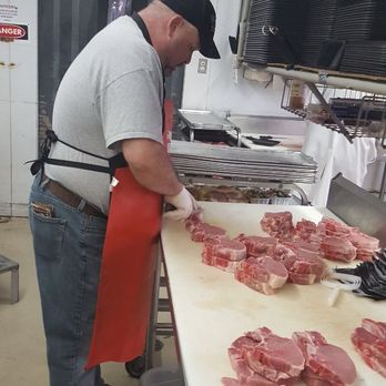 Sun Fest Market - Lance, Meat Cutter, is cutting some fresh pork chops. Do you have a question about a cut of meat? Ask one of our Professional Meat Cutters! - Grocery Near Me - Holiday Island, Arkansas Sun Fest Market - Lance, Meat Cutter, is cutting some fresh pork chops. Do you have a question about a cut of meat? Ask one of our Professional Meat Cutters! - Grocery Near Me - Holiday Island, Arkansas