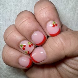 Suite Nails - Titi (nail tech) Dip powder as a base, gel design on top.