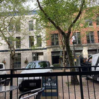 Caffè Umbria - Outdoor seating area looking into the walking street - Coffee & Tea Near Me - Seattle, Washington