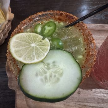 Victoria Cocina Mexicana - Avocado cucumber margarita, fresh slices of jalapeños on top, with lime and cucumber! - Mexican Near Me - Tucson, Arizona Victoria Cocina Mexicana - Avocado cucumber margarita, fresh slices of jalapeños on top, with lime and cucumber! - Mexican Near Me - Tucson, Arizona