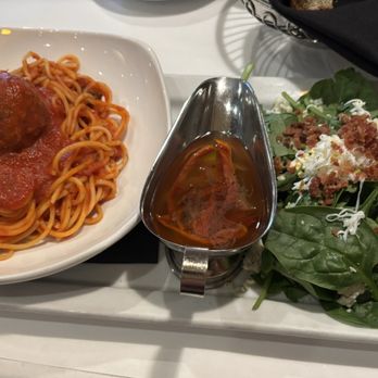 Lugano Ristorante - Half & half: half spaghetti with meatball and half spinach salad - Italian Near Me - Cary, North Carolina Lugano Ristorante - Half & half: half spaghetti with meatball and half spinach salad - Italian Near Me - Cary, North Carolina