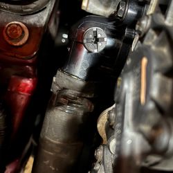 Harkins Auto and Cycle - Check Engine light on for thermostat. Diagnosed and replaced thermostat, gasket, and housing.