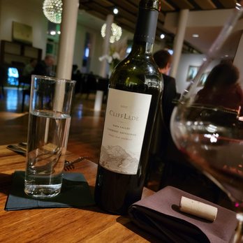 Silo Prime - a bottle of wine and a glass of water - Steakhouses Near Me - San Antonio, Texas Silo Prime - a bottle of wine and a glass of water - Steakhouses Near Me - San Antonio, Texas