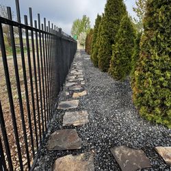 Wild Land Irrigation - New stone and rock path along our back fence for easy access