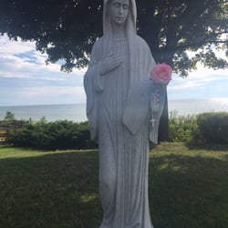 St Basil Catholic Church - Our Lady of Medjugorje- located across the street from the church with the beautiful Lake Michigan in the background.