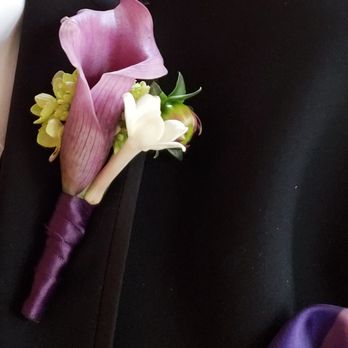 Wild Poppy Florist - A boutonnière floral decoration on the tuxedo lapel - Florists Near Me - Bend, Oregon Wild Poppy Florist - A boutonnière floral decoration on the tuxedo lapel - Florists Near Me - Bend, Oregon