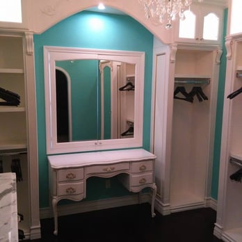 Dana Woodworks - a dressing room with a chandelier - General Contractors Near Me - San clemente, California
