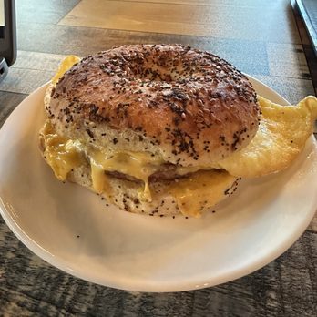 MET BrewMasters - Sausage egg and cheese on a homemade everything bagel - Coffee & Tea Near Me - Norcross, Georgia MET BrewMasters - Sausage egg and cheese on a homemade everything bagel - Coffee & Tea Near Me - Norcross, Georgia