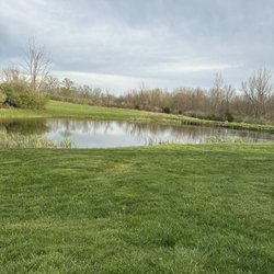 Deer Creek Camping Resort - View from our camper of the nice pond stocked with fish for everyone to catch and release