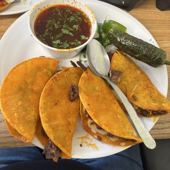 El Primo - 4 birria tacos with a fantastic consume and a chile toreado. - Convenience Stores Near Me - Mc Kinney, Texas El Primo - 4 birria tacos with a fantastic consume and a chile toreado. - Convenience Stores Near Me - Mc Kinney, Texas