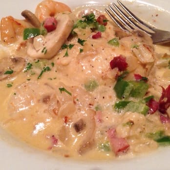 Boatwright's Dining Hall - Shrimp with cheesy grits. - Cajun/Creole Near Me - Lake Buena Vista, Florida Boatwright's Dining Hall - Shrimp with cheesy grits. - Cajun/Creole Near Me - Lake Buena Vista, Florida