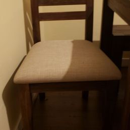 The before picture with the cloth seat.