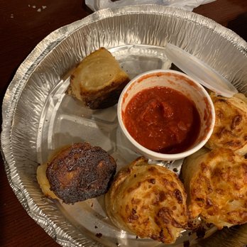 Juba Pizza Bar - The burnt cheesy garlic rolls!!! Sad isn't it!! - Sports Bars Near Me - Bonham, Texas
