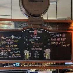 Finnegan's Easy - Happy hour sign