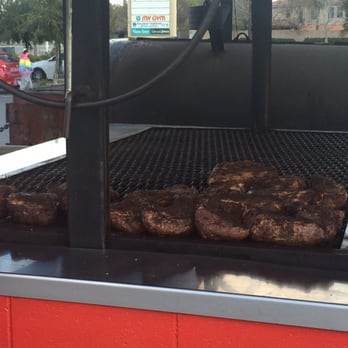 Meat Market - Clovis - Whole Tri Tips on the grill.  Got a whole one for Tri Tip Tuesday Special and a sammich too. - Meat Shops Near Me - Clovis, California