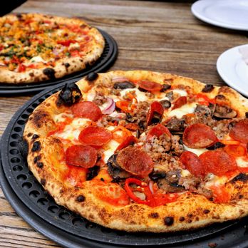 Spark Pizza - Homage to Frankie's: tomato sauce, mozzarella, Italian sausage, pepperoni cups, basil, pickled peppers, mushrooms, red onions ($23). - Pizza Near Me - Redmond, Washington Spark Pizza - Homage to Frankie's: tomato sauce, mozzarella, Italian sausage, pepperoni cups, basil, pickled peppers, mushrooms, red onions ($23). - Pizza Near Me - Redmond, Washington