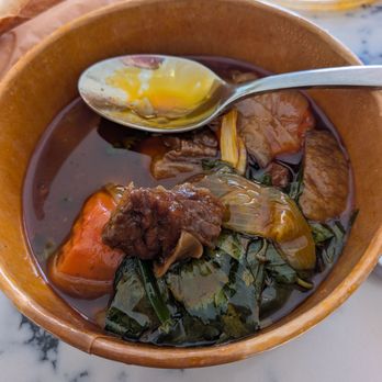 Saigon Social Cafe - Bo kho. It was very oily that it coated my spoon and you can see the glossy oil on the broth. - Coffee & Tea Near Me - San Jose, California Saigon Social Cafe - Bo kho. It was very oily that it coated my spoon and you can see the glossy oil on the broth. - Coffee & Tea Near Me - San Jose, California