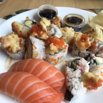 HIRO Sushi - This is a King Roll and two Salmon nigiri that I really devoured quickly after taking this pic! - Japanese Near Me - Medford, Oregon HIRO Sushi - This is a King Roll and two Salmon nigiri that I really devoured quickly after taking this pic! - Japanese Near Me - Medford, Oregon