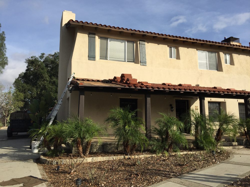 Slide of Sutton Roofing and Solar