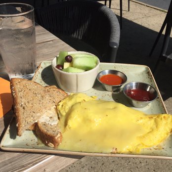 First Watch - Crab Omelet with Chahula on side. Not even close to advertised picture - American Near Me - Chantilly, Virginia First Watch - Crab Omelet with Chahula on side. Not even close to advertised picture - American Near Me - Chantilly, Virginia