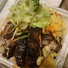 Jerk chicken, cabbage with macaroni and cheese Jerk chicken, cabbage with macaroni and cheese