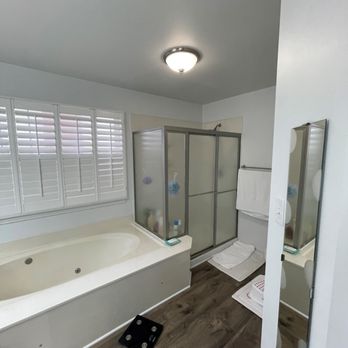 Twin Cedars Design - Narrow shower and oversized tub were reconfigured for a more balanced look - Countertop Installation Near Me - Lake Saint Louis, Missouri Twin Cedars Design - Narrow shower and oversized tub were reconfigured for a more balanced look - Countertop Installation Near Me - Lake Saint Louis, Missouri