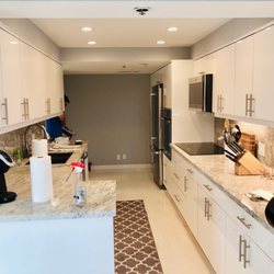 Rapid Reconstruction Team - We opened the space in this kitchen by bringing the light in.