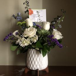 This is the 'PREMIUM' arrangement that was delivered. There are not as many flowers nor are they as full as shown is sample.