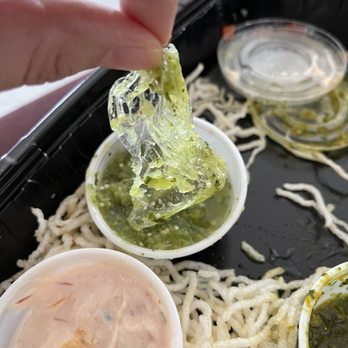 The Cheesecake Factory - Long piece of plastic wrap found in one of the sauces that came with the egg roll sampler - Desserts Near Me - Wayne, New Jersey