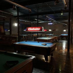 Brickhouse Saloon - We have 10 pool tables throughout our building.