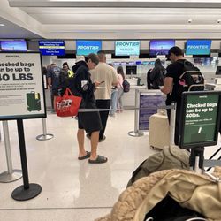 Frontier Airlines - Thank you so much for your hospitality Frontier. I was 1 pound over and got threatened to be kicked off my flight.