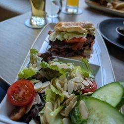 Hendricks Resto-Lounge - Happy hour burger,salad and beer- I couldn't resist taking a bite first.