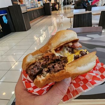 Smack Town - a hand holding a hot dog - Burgers Near Me - Vancouver, Washington