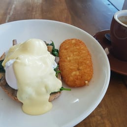Spinach and mushroom Eggs Benedict with a hash brown. Spinach and mushroom Eggs Benedict with a hash brown.