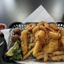 Who Dat Seafood Restaurant & Sports Bar - Shrimp and fish lunch basket. Hush puppies and fries are great, too!
