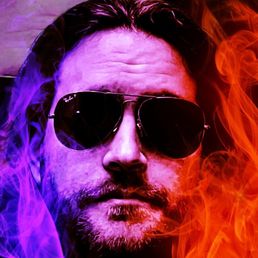 a man with sunglasses and a beard a man with sunglasses and a beard
