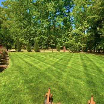 Santana Landscaping - a lawn mower cutting grass - Landscaping Near Me - Charlotte, North Carolina Santana Landscaping - a lawn mower cutting grass - Landscaping Near Me - Charlotte, North Carolina