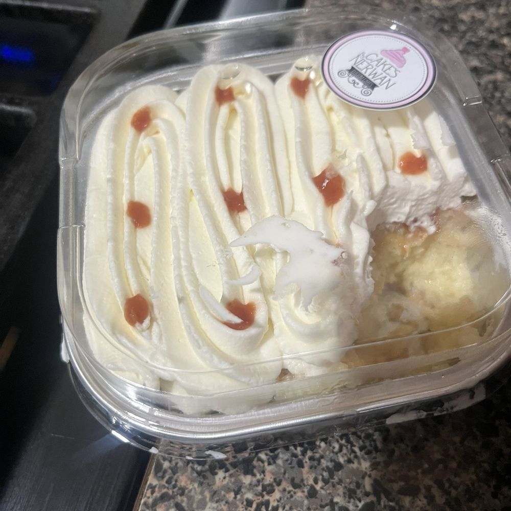 Cakes By Nerwan - Guava Tres Leches (yes that's my bite on the corner) - Bakeries Near Me - Astoria, New York
