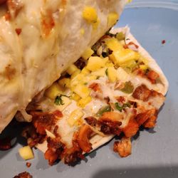 La gringa 3 - This is a "gringa". A quesadilla made with pastor (marinated pork, cooked like a falafel) with cheese, pineapple, onion, and cilantro.