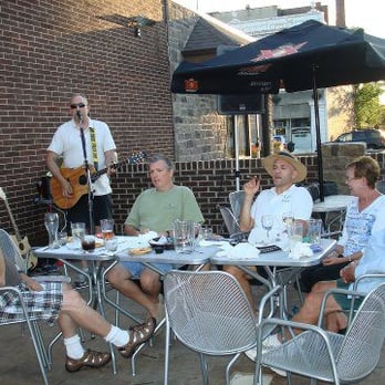StoneYard Grill & Tavern - Guests enjoying live music on our patio. - New American Near Me - Niles, Ohio StoneYard Grill & Tavern - Guests enjoying live music on our patio. - New American Near Me - Niles, Ohio