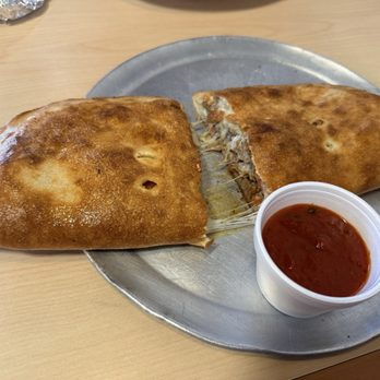 Dante’s Italian Eatery - Meat lovers calzone - Pasta Shops Near Me - Euless, Texas Dante’s Italian Eatery - Meat lovers calzone - Pasta Shops Near Me - Euless, Texas