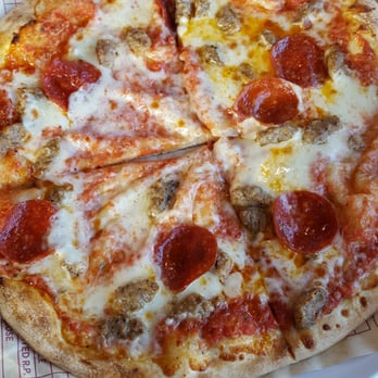MOD Pizza - Service was ok, ordering was easy, but the pizza had a huge air bubble, see picture. The employee didn't offer any apologies or fixes. - Pizza Near Me - Downey, California