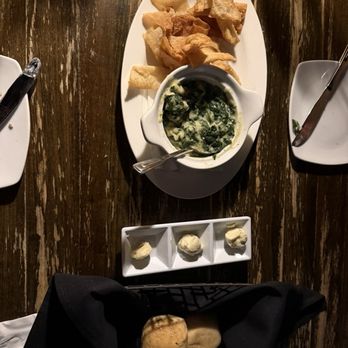 The Rack House Steaks & Spirits - Spinach dip with wonton chips and super soft warm rolls with three different types of butter! - Steakhouses Near Me - Gulfport, Mississippi The Rack House Steaks & Spirits - Spinach dip with wonton chips and super soft warm rolls with three different types of butter! - Steakhouses Near Me - Gulfport, Mississippi