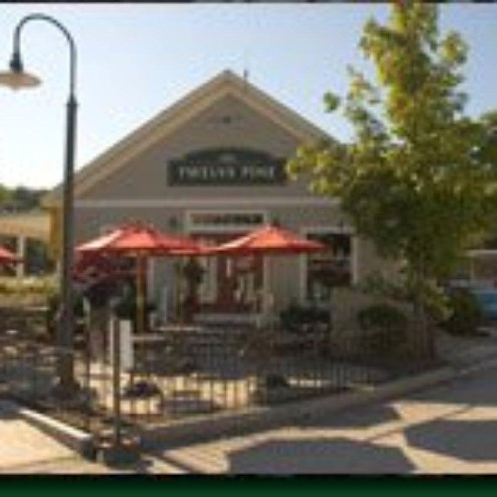 Twelve Pine - the outside of a restaurant with red umbrellas - Specialty Food Near Me - Peterborough, New Hampshire Twelve Pine - the outside of a restaurant with red umbrellas - Specialty Food Near Me - Peterborough, New Hampshire
