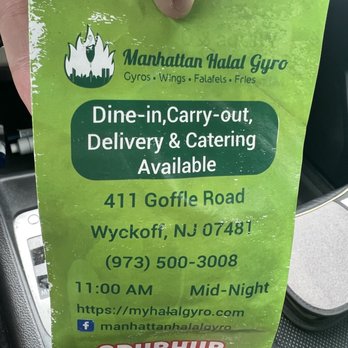 Manhattan Halal Gyro - a hand holding a green bag of food - Halal Near Me - Wyckoff, New Jersey Manhattan Halal Gyro - a hand holding a green bag of food - Halal Near Me - Wyckoff, New Jersey