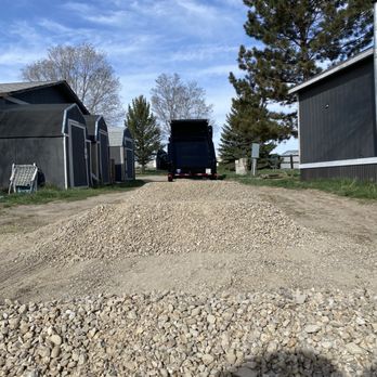 Grunts Load N Dump Junk Removal - Spreading gravel in customer's driveway. - Junk Removal & Hauling Near Me Grunts Load N Dump Junk Removal - Spreading gravel in customer's driveway. - Junk Removal & Hauling Near Me