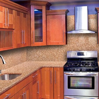 Innovative Interiors - a modern kitchen with stainless steel appliances - Flooring Near Me Innovative Interiors - a modern kitchen with stainless steel appliances - Flooring Near Me