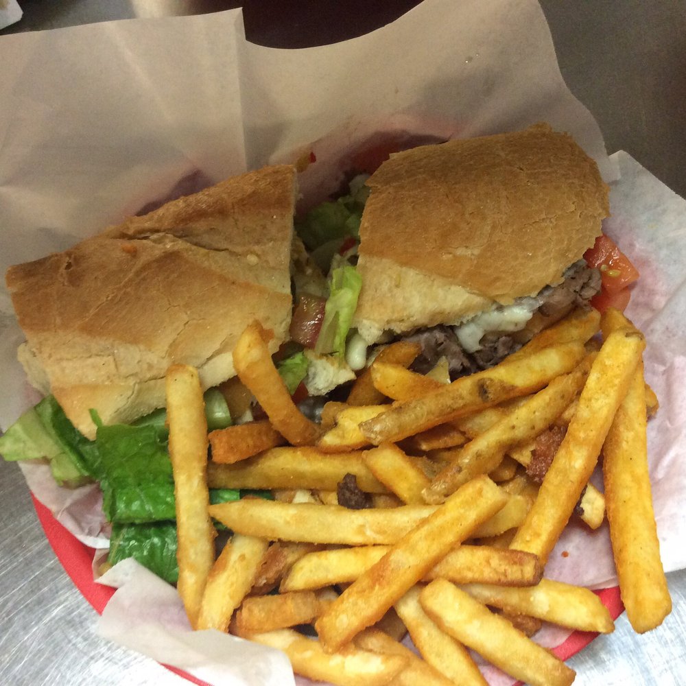 Marty's Sports Bar - a sandwich and french fries - Sports Bars Near Me - Springfield, Missouri