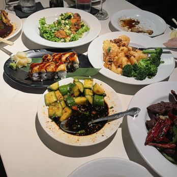 Wokcano - Cucumber Salad Baked Salmon Roll Honey Walnut Shrimp Crispy Garlic Chicken Wings (6 Pcs.) - Chinese Near Me - Los Angeles, California